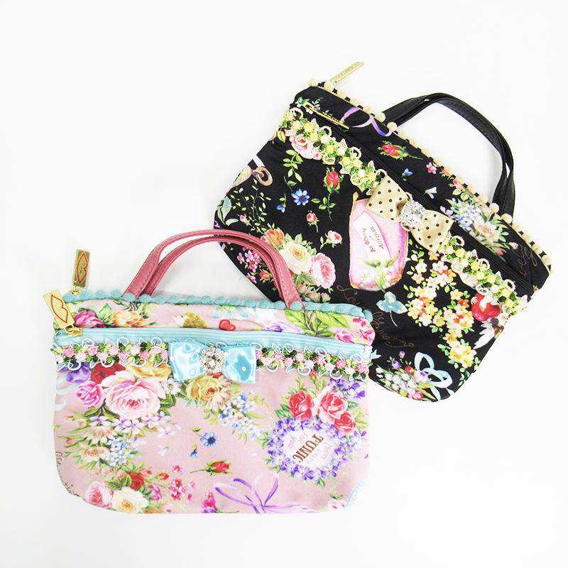 TUNIC シャイニーデイの手付きポーチ